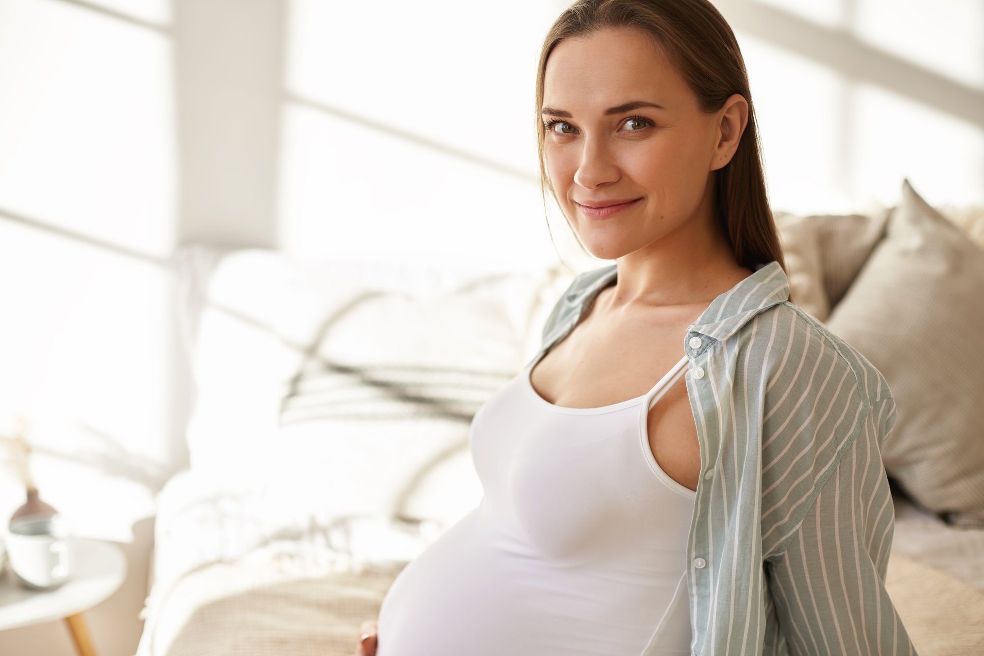 adorable-cute-young-pregnant-woman-posing (1)