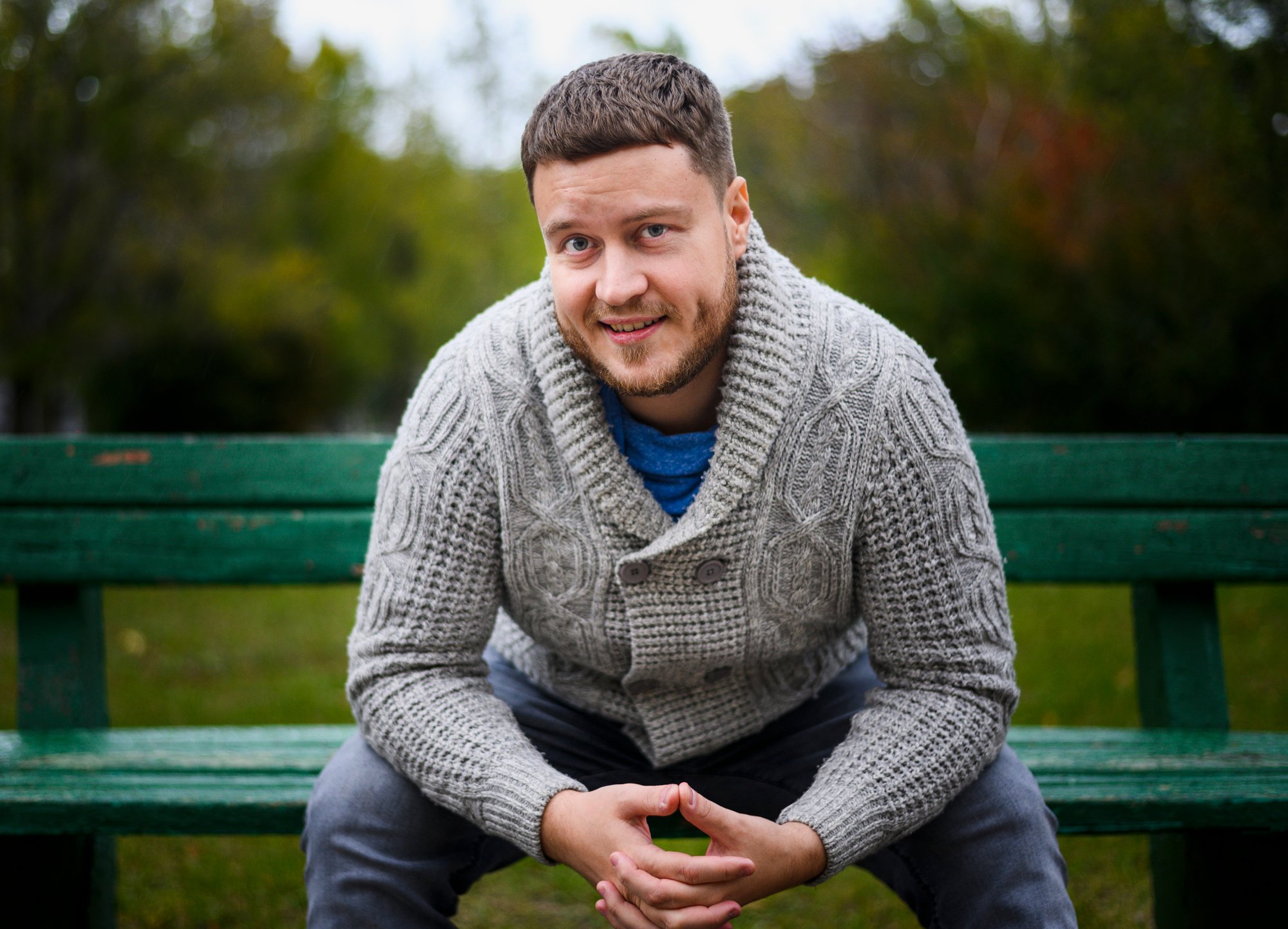 young-man-bench-with-hands-together young-man-bench-with-hands-together