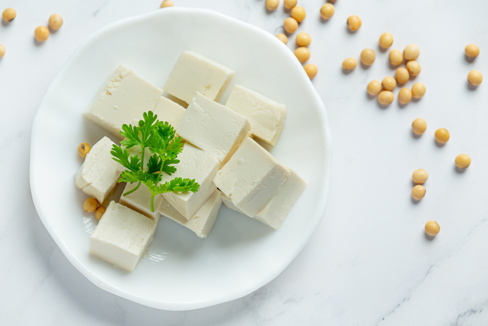 Tofu made from soybeans on white plate