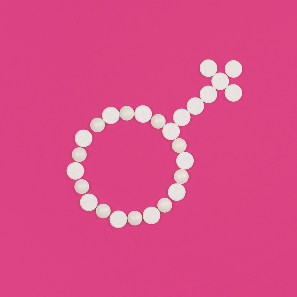 Womens-health-pharmaceutical-clinical-trial-concept-white-pills-on-pink-background-female-symbol Womens-health-pharmaceutical-clinical-trial-concept-white-pills-on-pink-background-female-symbol